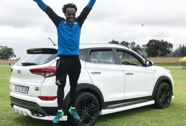 Percy Tau House and Cars
