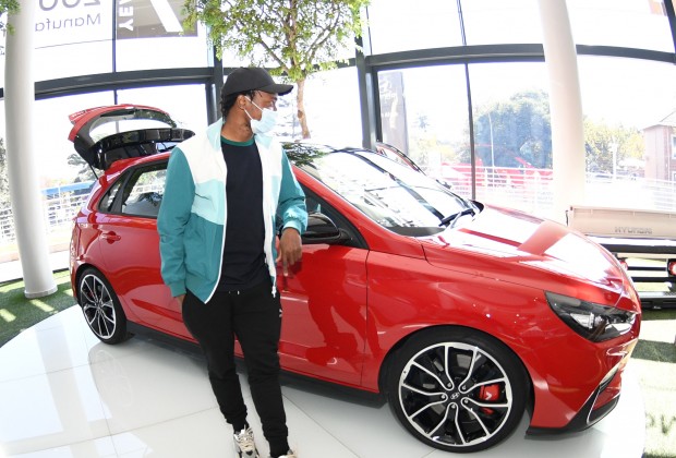 Percy Tau House and Cars